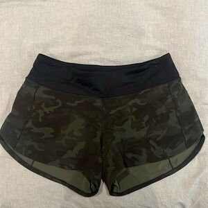 4” mid rise Lululemon shorts, camo, with zip pocket size 10